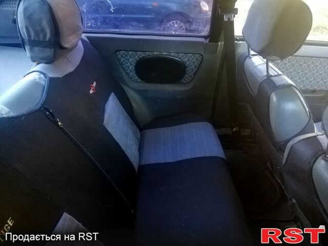 Красный ЗАЗ Таврия, объемом двигателя 1.3 л и пробегом 214 тыс. км за 1350 $, фото 5 на Automoto.ua