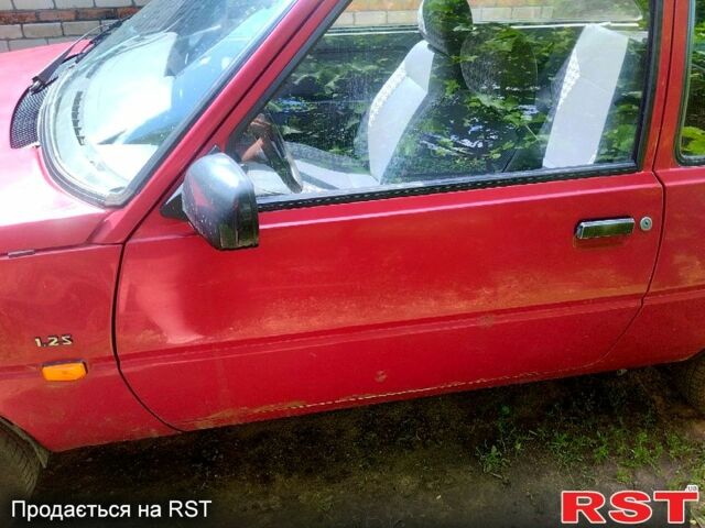 Красный ЗАЗ Таврия, объемом двигателя 1.1 л и пробегом 150 тыс. км за 800 $, фото 4 на Automoto.ua