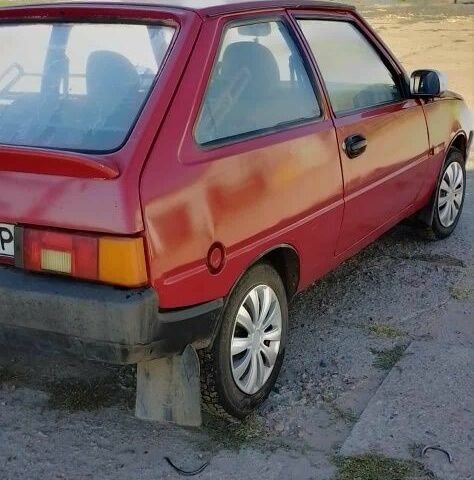 Красный ЗАЗ Таврия, объемом двигателя 1 л и пробегом 920 тыс. км за 596 $, фото 2 на Automoto.ua