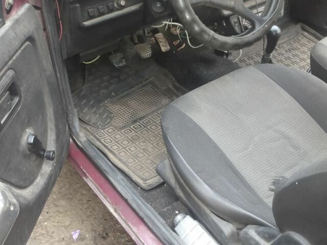 Красный ЗАЗ Таврия, объемом двигателя 1 л и пробегом 100 тыс. км за 750 $, фото 4 на Automoto.ua