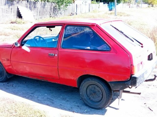 Красный ЗАЗ Таврия, объемом двигателя 1 л и пробегом 55 тыс. км за 267 $, фото 2 на Automoto.ua