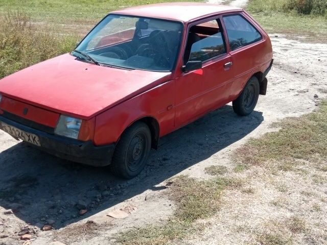 Красный ЗАЗ Таврия, объемом двигателя 1 л и пробегом 55 тыс. км за 267 $, фото 3 на Automoto.ua