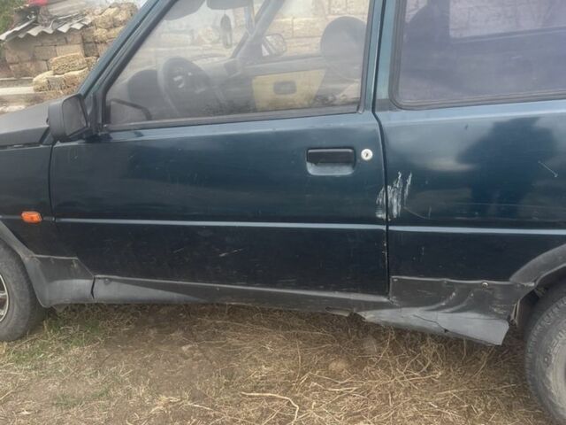 Зеленый ЗАЗ Таврия, объемом двигателя 1.1 л и пробегом 250 тыс. км за 713 $, фото 2 на Automoto.ua