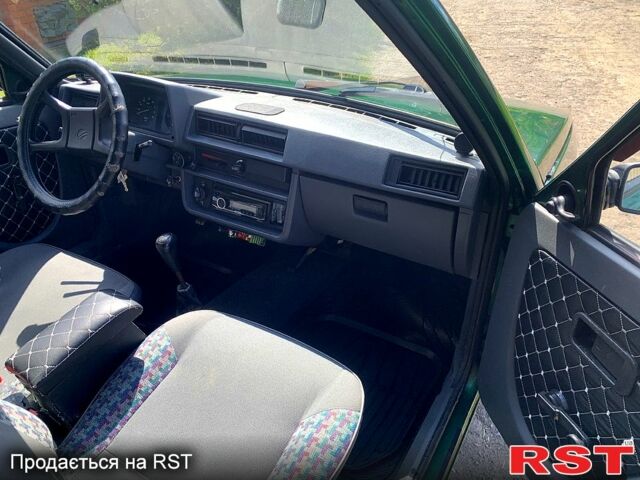 Зеленый ЗАЗ Таврия, объемом двигателя 1.2 л и пробегом 75 тыс. км за 1400 $, фото 5 на Automoto.ua