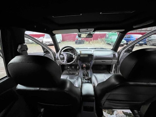 Сірий ЗХ Лендмарк, об'ємом двигуна 2.4 л та пробігом 159 тис. км за 10000 $, фото 17 на Automoto.ua