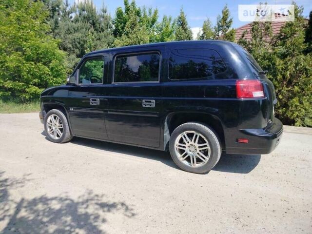 Черный Mobility Ventures MV-1, объемом двигателя 4.6 л и пробегом 44 тыс. км за 15200 $, фото 7 на Automoto.ua