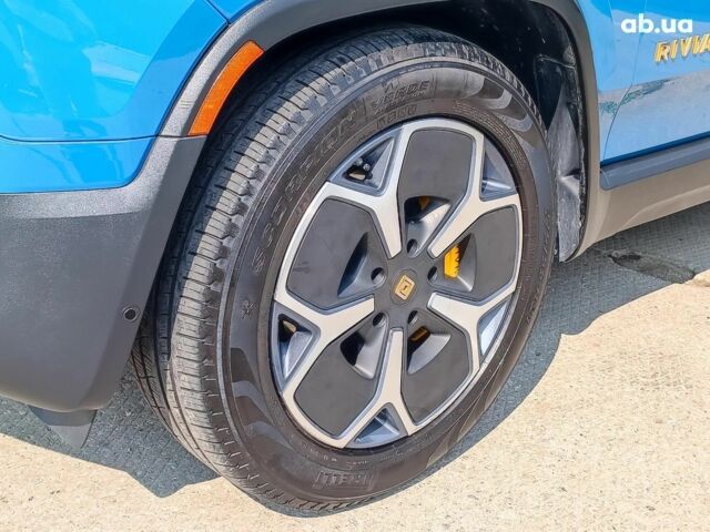 Синий Rivian R1S, объемом двигателя 0 л и пробегом 10 тыс. км за 55990 $, фото 2 на Automoto.ua