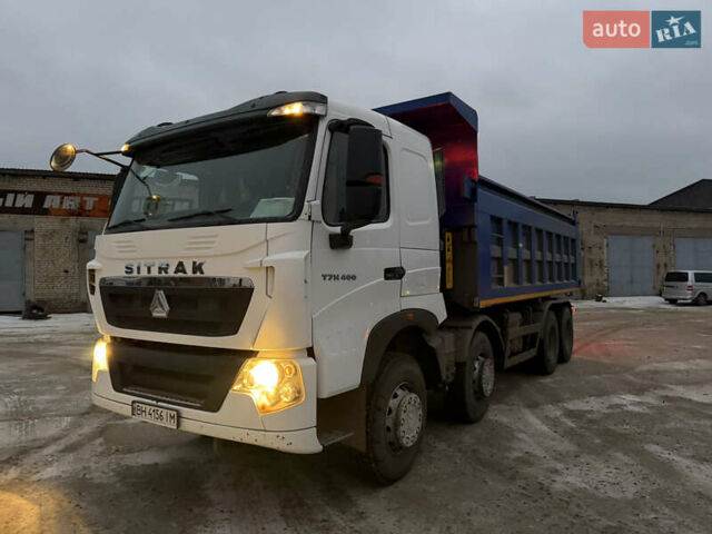 Белый Sinotruk T7H, объемом двигателя 10.52 л и пробегом 328 тыс. км за 48500 $, фото 2 на Automoto.ua