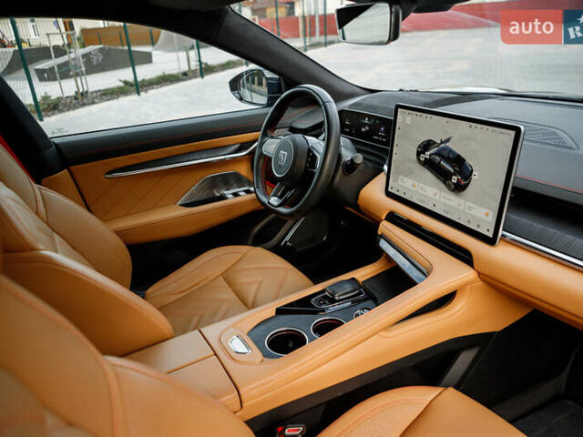 Zeekr 001 2023 у Бару на Automoto.ua Чорний Zeekr 001, об'ємом двигуна 0 л та пробігом 43 тис. км за 33900 $, фото 13 на Automoto.ua