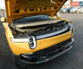 Желтый Rivian R1S, объемом двигателя 0 л и пробегом 16 тыс. км за 29900 $, фото 1 на Automoto.ua