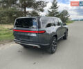 Серый Rivian R1S, объемом двигателя 0 л и пробегом 39 тыс. км за 56000 $, фото 1 на Automoto.ua