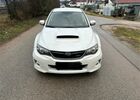 Белый Субару WRX STI, объемом двигателя 2.46 л и пробегом 93 тыс. км за 25583 $, фото 1 на Automoto.ua