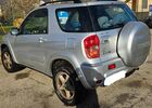 Тойота РАВ 4 2003 у Європі на Automoto.ua Срібний Тойота РАВ 4, об'ємом двигуна 2 л та пробігом 194 тис. км за 4664 $, фото 1 на Automoto.ua
