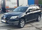 Мицубиси Аутлендер 2005 в Европе на Automoto.ua Черный Мицубиси Аутлендер, объемом двигателя 1 л и пробегом 227 тыс. км за 15900 $, фото 1 на Automoto.ua