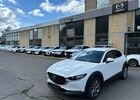 Белый Мазда CX-30, объемом двигателя 2 л и пробегом 70 тыс. км за 23876 $, фото 1 на Automoto.ua