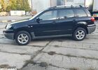 Мицубиси Аутлендер 2005 в Европе на Automoto.ua Черный Мицубиси Аутлендер, объемом двигателя 1 л и пробегом 227 тыс. км за 15900 $, фото 18 на Automoto.ua