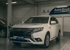 Білий Міцубісі Outlander PHEV, об'ємом двигуна 2.36 л та пробігом 30 тис. км за 32054 $, фото 1 на Automoto.ua