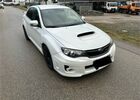 Белый Субару WRX STI, объемом двигателя 2.46 л и пробегом 93 тыс. км за 25583 $, фото 2 на Automoto.ua