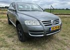 Фольксваген Туарег 2004 у Європі на Automoto.ua Сірий Фольксваген Туарег, об'ємом двигуна 3.19 л та пробігом 282 тис. км за 4113 $, фото 1 на Automoto.ua