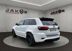 Білий Джип Grand Cherokee, об'ємом двигуна 6.42 л та пробігом 80 тис. км за 53817 $, фото 4 на Automoto.ua