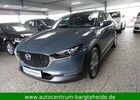 Серый Мазда CX-30, объемом двигателя 2 л и пробегом 94 тыс. км за 19903 $, фото 2 на Automoto.ua