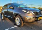 Коричневий Кіа Sportage, об'ємом двигуна 2 л та пробігом 82 тис. км за 13985 $, фото 1 на Automoto.ua