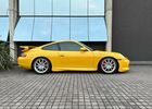 Желтый Порше 911, объемом двигателя 3.6 л и пробегом 37 тыс. км за 178186 $, фото 3 на Automoto.ua