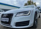 Белый Ауди A7 Sportback, объемом двигателя 2.97 л и пробегом 82 тыс. км за 25823 $, фото 1 на Automoto.ua