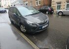 Серый Опель Zafira Tourer, объемом двигателя 1.36 л и пробегом 111 тыс. км за 11401 $, фото 1 на Automoto.ua