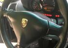 Черный Порше 911, объемом двигателя 3.6 л и пробегом 108 тыс. км за 37797 $, фото 5 на Automoto.ua