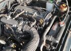 Зелений Сузукі Джімні, об'ємом двигуна 1.3 л та пробігом 109 тис. км за 8065 $, фото 7 на Automoto.ua