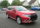 Червоний Міцубісі Outlander PHEV, об'ємом двигуна 2.36 л та пробігом 91 тис. км за 29528 $, фото 2 на Automoto.ua