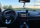 Кіа Sportage, об'ємом двигуна 2 л та пробігом 178 тис. км за 10799 $, фото 14 на Automoto.ua