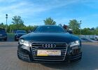 Черный Ауди A7 Sportback, объемом двигателя 3 л и пробегом 163 тыс. км за 21544 $, фото 1 на Automoto.ua