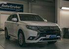 Білий Міцубісі Outlander PHEV, об'ємом двигуна 2.36 л та пробігом 30 тис. км за 32054 $, фото 2 на Automoto.ua