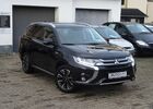 Чорний Міцубісі Outlander PHEV, об'ємом двигуна 2 л та пробігом 103 тис. км за 23175 $, фото 1 на Automoto.ua