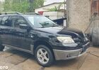 Мицубиси Аутлендер 2005 в Европе на Automoto.ua Черный Мицубиси Аутлендер, объемом двигателя 1 л и пробегом 227 тыс. км за 15900 $, фото 30 на Automoto.ua