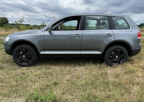 Фольксваген Туарег 2004 у Європі на Automoto.ua Сірий Фольксваген Туарег, об'ємом двигуна 3.19 л та пробігом 282 тис. км за 4113 $, фото 6 на Automoto.ua