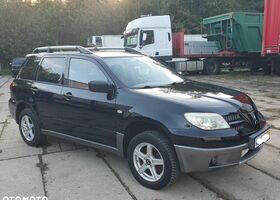 Мицубиси Аутлендер 2005 в Европе на Automoto.ua Черный Мицубиси Аутлендер, объемом двигателя 1 л и пробегом 227 тыс. км за 15900 $, фото 20 на Automoto.ua