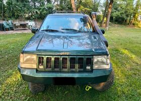 Джип Гранд Чероки 1996 в Европе на Automoto.ua Зеленый Джип Гранд Чероки, объемом двигателя 5.22 л и пробегом 170 тыс. км за 9895 $, фото 1 на Automoto.ua