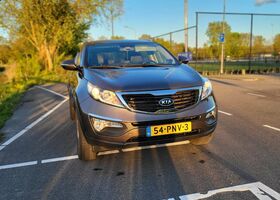 Коричневий Кіа Sportage, об'ємом двигуна 2 л та пробігом 82 тис. км за 13985 $, фото 1 на Automoto.ua