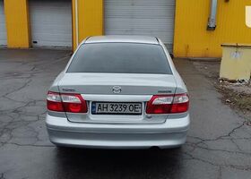 Мазда 626, Седан 1997 - 2001 V (GF) 2.5 V6