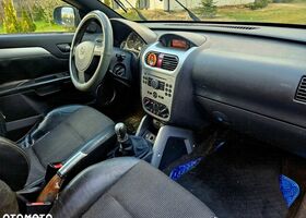 Опель Тигра, объемом двигателя 1.36 л и пробегом 220 тыс. км за 1069 $, фото 4 на Automoto.ua