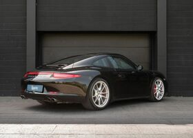 Черный Порше 991, объемом двигателя 3.8 л и пробегом 103 тыс. км за 91819 $, фото 2 на Automoto.ua