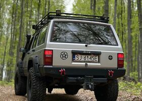 Джип Cherokee, об'ємом двигуна 3.96 л та пробігом 151 тис. км за 11771 $, фото 1 на Automoto.ua