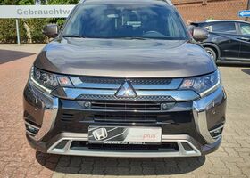 Коричневый Мицубиси Outlander PHEV, объемом двигателя 2.36 л и пробегом 40 тыс. км за 31379 $, фото 1 на Automoto.ua