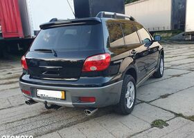 Мицубиси Аутлендер 2005 в Европе на Automoto.ua Черный Мицубиси Аутлендер, объемом двигателя 1 л и пробегом 227 тыс. км за 15900 $, фото 6 на Automoto.ua