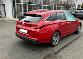 Красный Хендай i30, объемом двигателя 1.6 л и пробегом 136 тыс. км за 6885 $, фото 4 на Automoto.ua