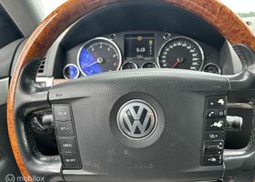 Фольксваген Туарег 2004 у Європі на Automoto.ua Сірий Фольксваген Туарег, об'ємом двигуна 3.19 л та пробігом 282 тис. км за 4113 $, фото 13 на Automoto.ua