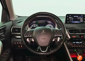Мицубиси Eclipse Cross 2018 в Европе на Automoto.ua Белый Мицубиси Eclipse Cross, объемом двигателя 1.5 л и пробегом 102 тыс. км за 17446 $, фото 12 на Automoto.ua